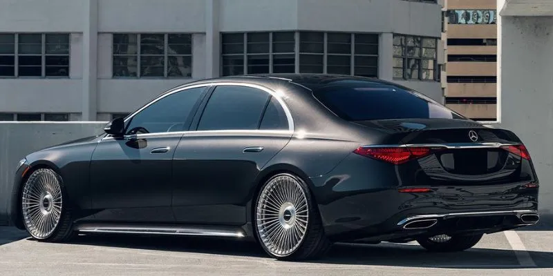 Rear side view of a black Mercedes-Benz S-Class executive luxury sedan